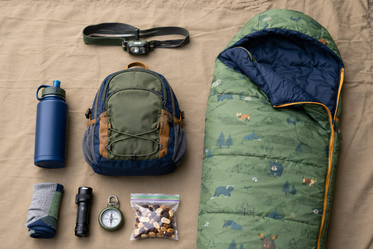 kids camping gear kit flat lay