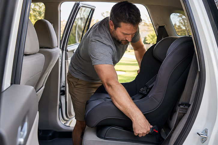 "car seat installed before packing camping gear around it