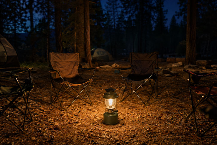 camping lantern lighting family campfire circle