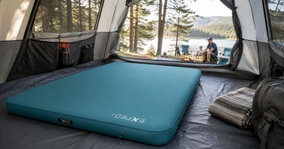 self-inflating camping sleeping pad inside family tent