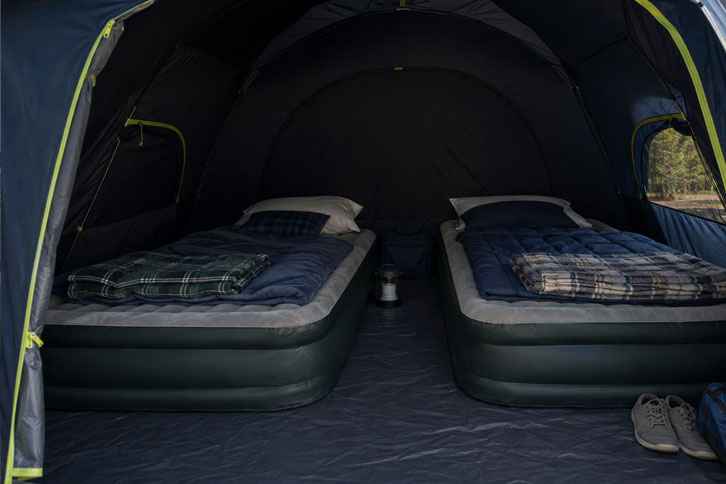coleman dark room tent review - dark interior of Coleman Dark Room tent blocking morning sunlight